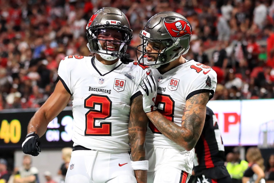 ATLANTA, GA - SEPTEMBER 07: Tampa Bay Buccaneers Wide Receiver Emeka Egbuka (2) runs into the end zone for the touchdown and celebrates with Wide Receiver Mike Evans (13) during the regular season game between the Tampa Bay Buccaneers and the Atlanta Falcons on September 07, 2025 at Mercedes-Benz Stadium in Atlanta, GA. (Photo by Cliff Welch/Icon Sportswire via Getty Images)