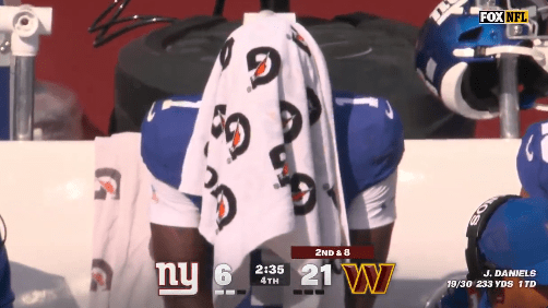 He was seen with a towel over his head as he sat on the bench